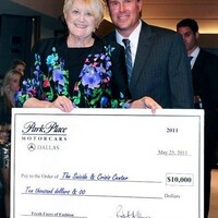 Robert Morris (GM at Park Place) presenting Margie Wright (Executive Director, Suicide and Crisis Center of North Texas) with a $10,000 check
